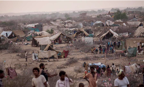 Displaced civilians are seen in Al Manjoorah temporary settlement at the outskirts of Beni Has